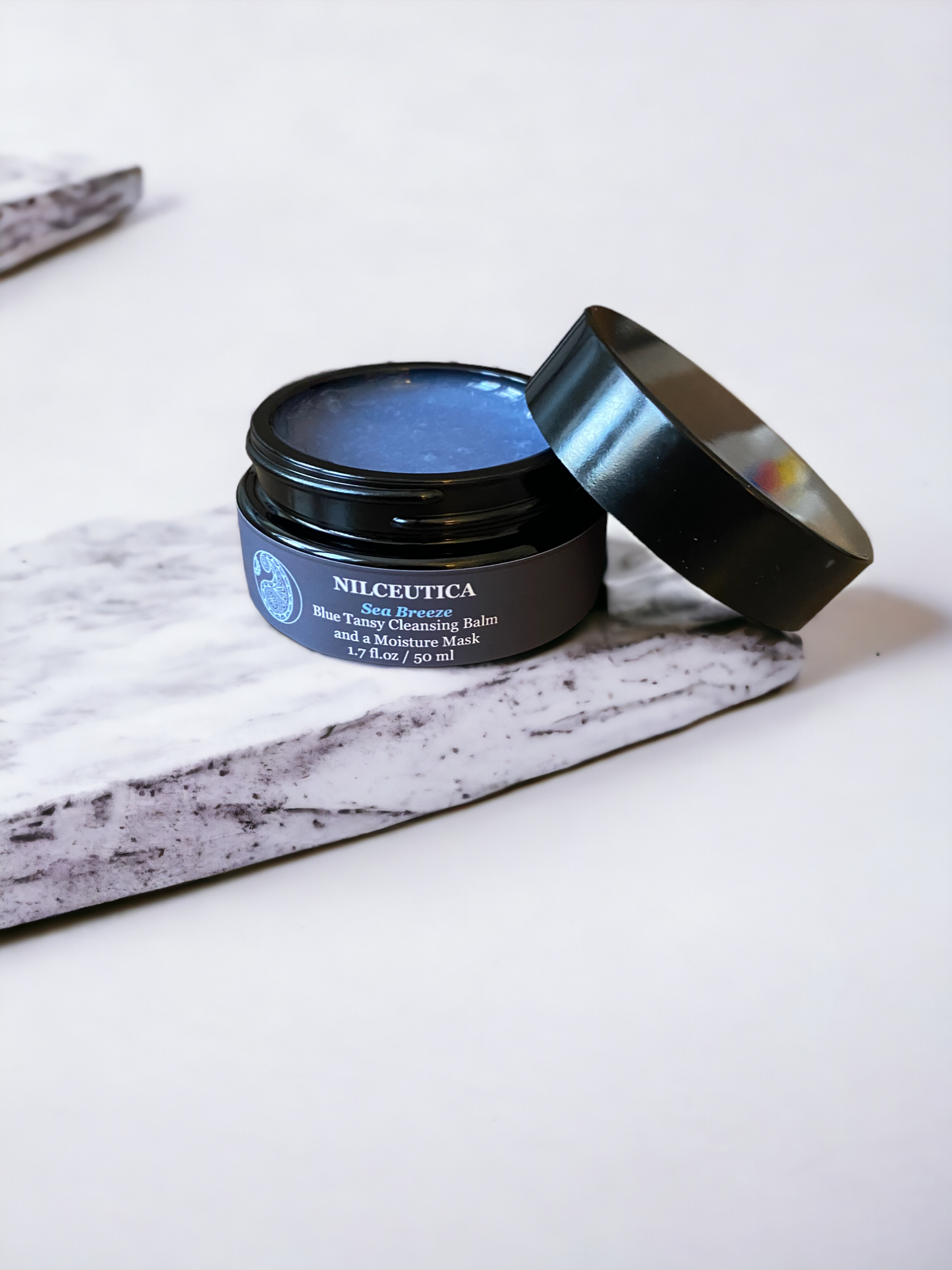 Sea Breeze Moisturizing Blue Tansy Cleansing Balm and a Moisture Mask