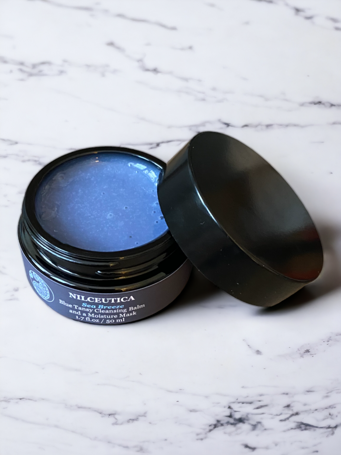 Sea Breeze Moisturizing Blue Tansy Cleansing Balm and a Moisture Mask